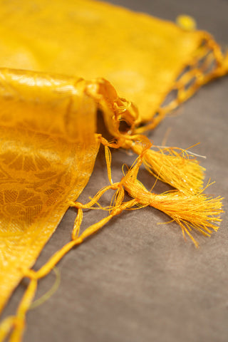 Yellow Banarasi dupatta with gold zari and pink highlights	