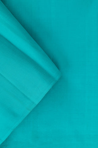 Peach Kanjivaram silk saree with blue pallu and gold motifs