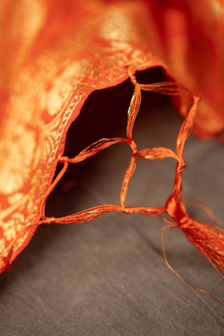 Orange art silk Banarasi dupatta with intricate gold zari weaving	