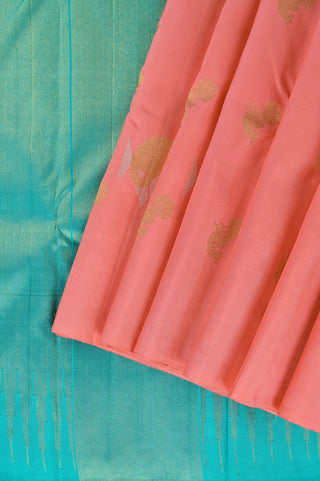 Peach Kanjivaram silk saree with blue pallu and gold motifs