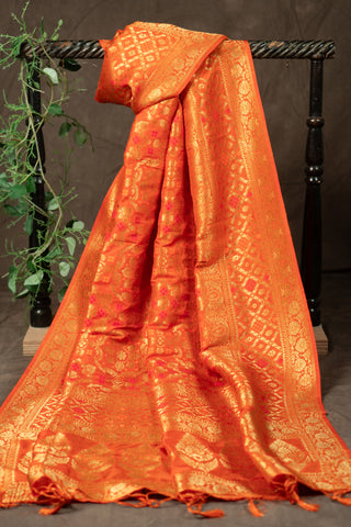 Orange art silk Banarasi dupatta with intricate gold zari weaving	