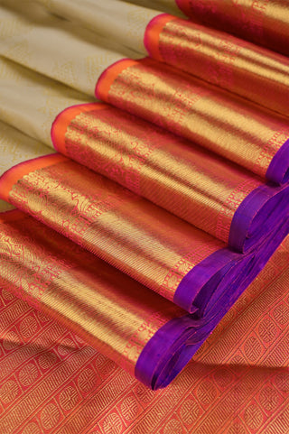 Cream Kanjivaram silk saree with orange and purple zari border