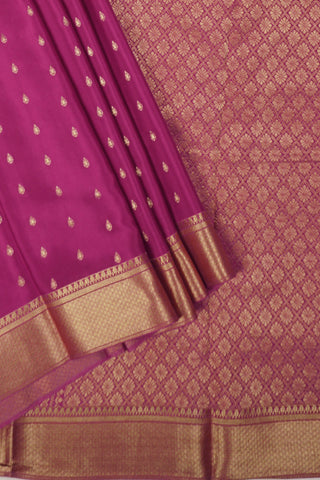 magenta crepe silk saree with droplet zari buttas