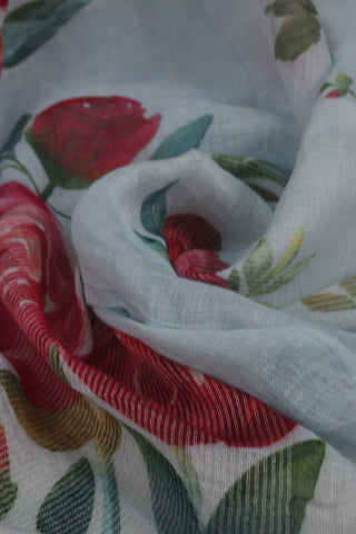 Light Blue Linen Saree with Vibrant Red Floral Motifs