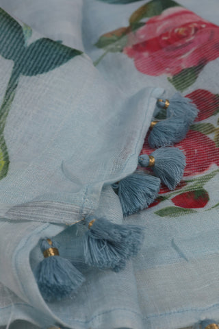 Light Blue Linen Saree with Vibrant Red Floral Motifs