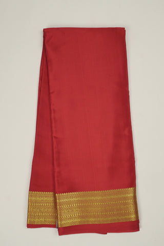 classic red crepe silk saree with broad zari border