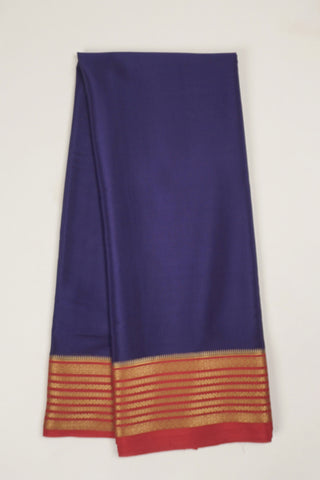 navy blue crepe silk saree with red temple zari border