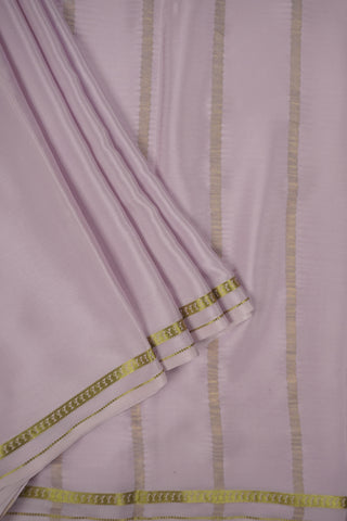 Lilac crepe silk saree with striped pallu