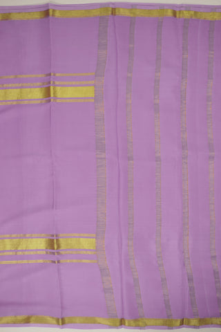 Lilac crepe silk saree with gold zari border