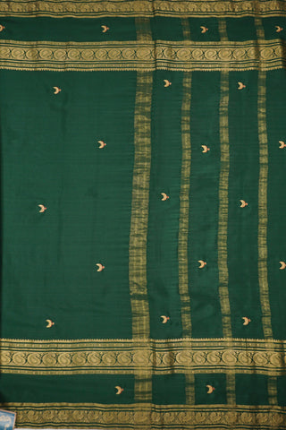 Bottle green crepe silk saree with Tanjore embroidery