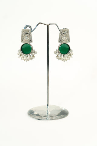 Silver replica drop earrings with an engraved peacock stud top, a bottle-green cabochon and white pearl clusters