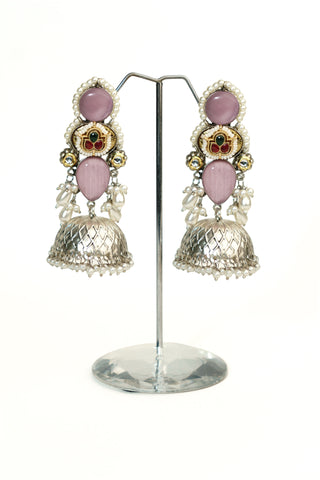 Long oxidised silver replica jhumkas with light pink stones, a pink and green centre stone and pearl drops