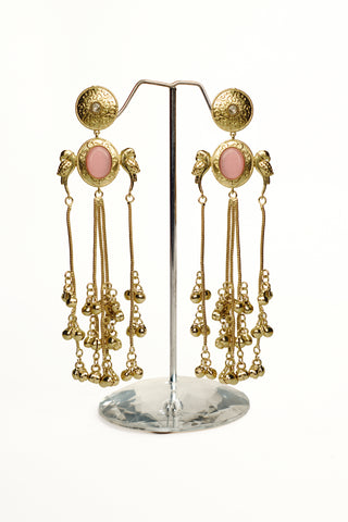 Golden long tassel earrings with twin parrot motifs around an oval pastel pink stone and ghungroo bell dangles