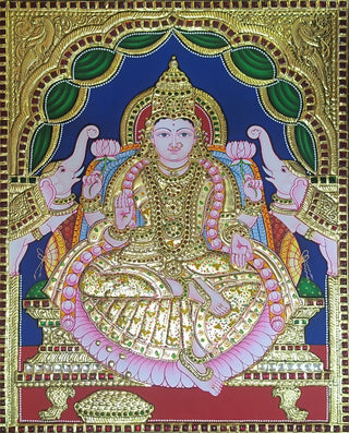 Handcrafted Gajalakshmi Tanjore painting with 22K gold leaf and semi-precious stones	