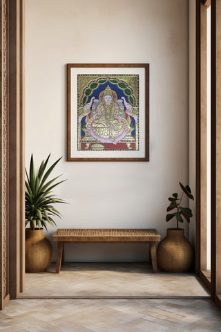 Handcrafted Gajalakshmi Tanjore painting with 22K gold leaf and semi-precious stones	