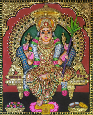 Golden Kamakshi Tanjore painting with 22K gold leaf and Gesso details	