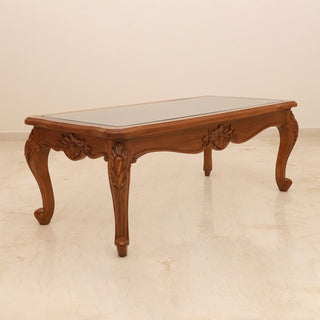 Antique glass coffee table with floral carved teakwood base