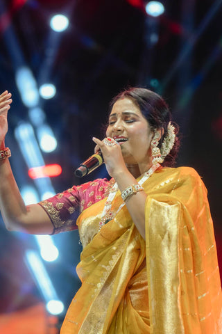 Dolly Jain & Shreya Ghoshal's Yellow Banarasi Organza Saree