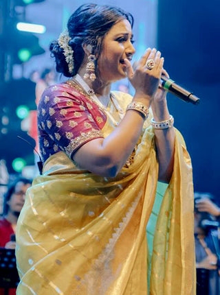 Dolly Jain & Shreya Ghoshal's Yellow Banarasi Organza Saree