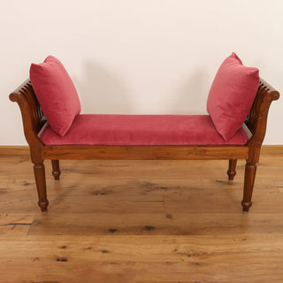 Red velvet rolled-arm bench with slatted teakwood arms and turned legs