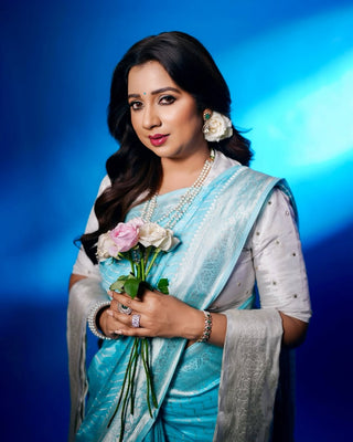 Shreya Ghoshal's Aqua Blue Pure Silk Banarasi Saree with Silver Zari