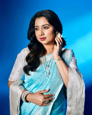 Shreya Ghoshal's Aqua Blue Pure Silk Banarasi Saree with Silver Zari