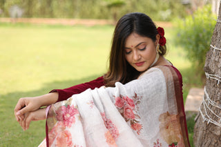 Niharicka's Cream and Maroon Floral Linen Saree