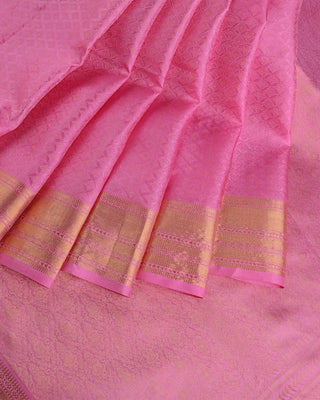 Baby pink soft silk saree with woven diamond pattern, gold zari border and matching blouse
