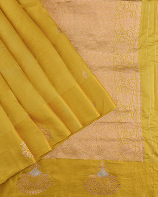 Bright haldi yellow Poona silk saree with silver-gold zari floral border and matching blouse
