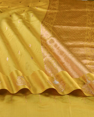 Bright haldi yellow Poona silk saree with silver-gold zari floral border and matching blouse