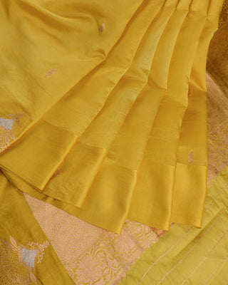 Bright haldi yellow Poona silk saree with silver-gold zari floral border and matching blouse