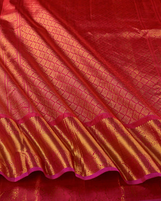 Pink rust orange dual tone pure silk Kanjivaram saree with large gold zari rudraksha buttas peacock medallion border