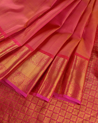 Pink rust orange dual tone pure silk Kanjivaram saree with large gold zari rudraksha buttas peacock medallion border