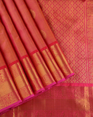 Pink rust orange dual tone pure silk Kanjivaram saree with large gold zari rudraksha buttas peacock medallion border