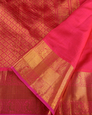 Pink rust orange dual tone pure silk Kanjivaram saree with large gold zari rudraksha buttas peacock medallion border
