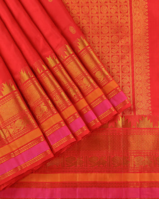 Red pure silk Kanjivaram saree with gold zari peacock temple border pink stripe edge and geometric mandala full zari pallu
