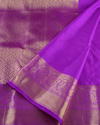Royal purple pure silk handwoven Kanjivaram saree with gold zari vanasingaram forest motif deer peacock vines and diamond pallu
