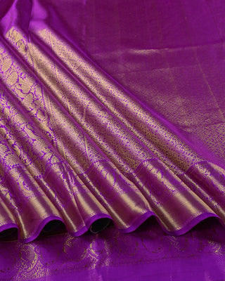 Royal purple pure silk handwoven Kanjivaram saree with gold zari vanasingaram forest motif deer peacock vines and diamond pallu