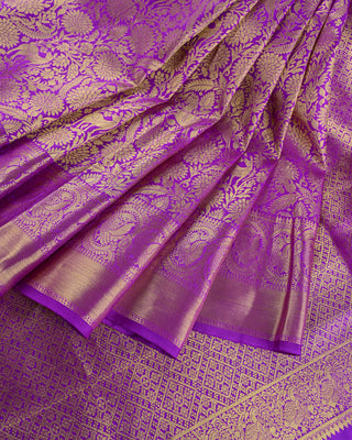 Royal purple pure silk handwoven Kanjivaram saree with gold zari vanasingaram forest motif deer peacock vines and diamond pallu