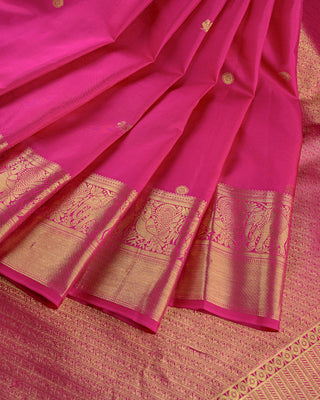 Dual-tone rani pink and red silk Kanjivaram saree with peacock and elephant motifs