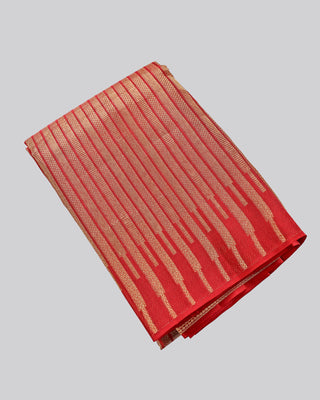 Crimson red Kanjivaram silk saree with gold zari stripes and brocade pallu