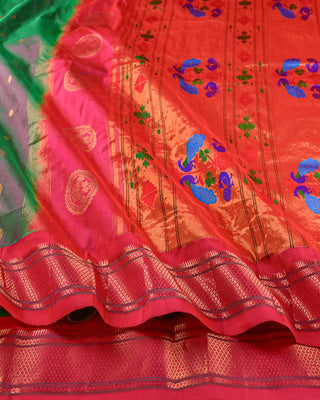 Green and rani pink pure silk Paithani saree with gold zari Narali border and multicolour peacock floral pallu