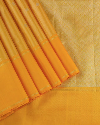 Golden mustard Kanjivaram silk saree with fine zari stripes and brocade pallu