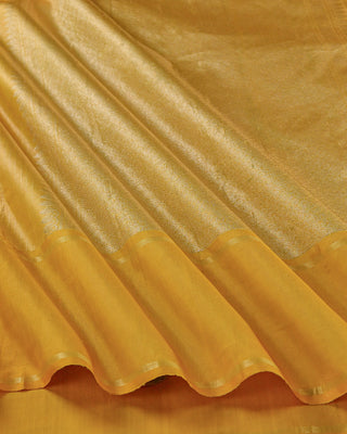 Golden mustard Kanjivaram silk saree with fine zari stripes and brocade pallu