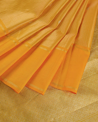 Golden mustard Kanjivaram silk saree with fine zari stripes and brocade pallu