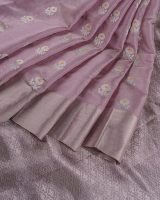 Pastel lavender tissue Chanderi silk saree with silver zari floral buttas orange meenakari and trellis pallu
