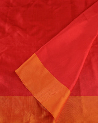 Bright crimson red soft silk saree with contrast orange border and golden zari pallu