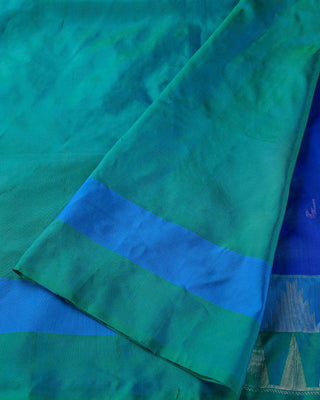 Peacock blue soft silk saree with contrast aqua green korvai temple border