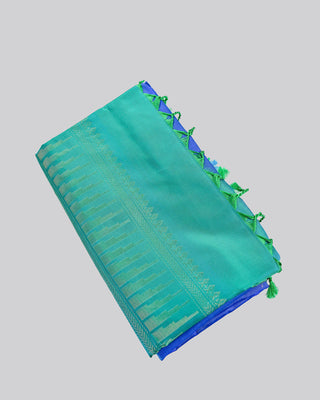 Peacock blue soft silk saree with contrast aqua green korvai temple border