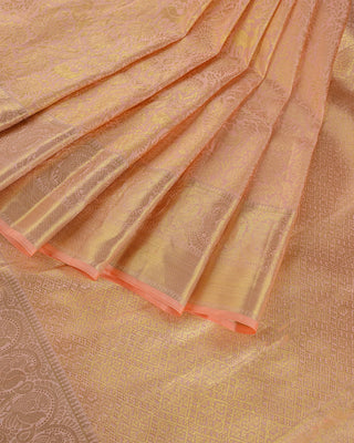 Pastel peach pink Kanjivaram silk saree with deer and peacock zari motifs